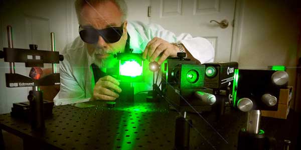 The author at his retirement residence with portable holography table, optics and laser.