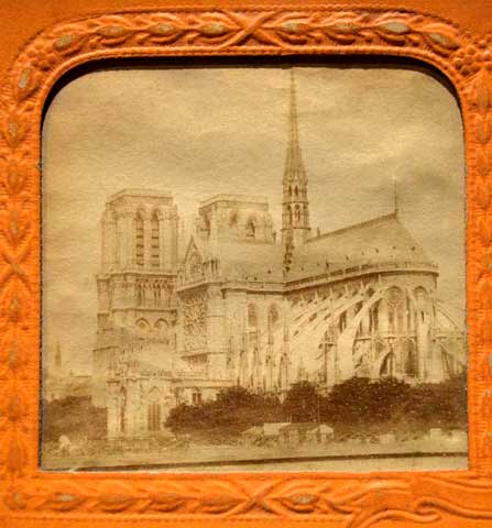 French tissue hold-to-light stereograph of Notre Dame taken in Paris, France in 1865.