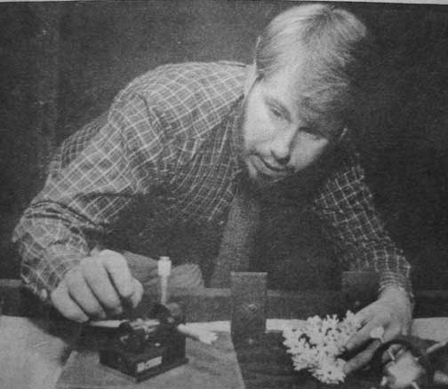 Frank DeFreitas in his laser and hologram lab, 1983